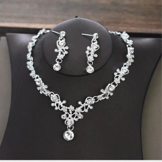 Elegant high-end bridal necklace by MANDOTOS featuring intricate gold and pearl design for wedding jewelry accessories.