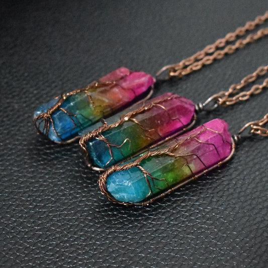 Mandotos stone crystal Pillar Tree of Life pendant necklace with intricate design, showcasing a stunning fashion jewelry piece.