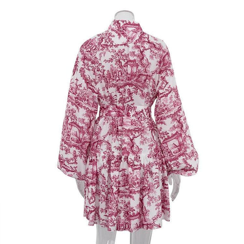 Mandotos ink print long sleeve short dress with puffy sleeves, lapel collar, tie waist, and A-line silhouette.