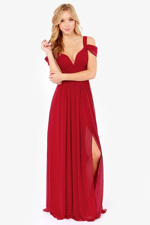 Long floor-length elegant Greek style pleated dress by MANDOTOS, showcasing flowing fabric and intricate pleats.