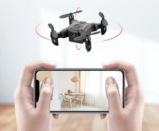 Mini folding drone from MANDOTOS with compact design and propellers, suitable for aerial photography and indoor flying.