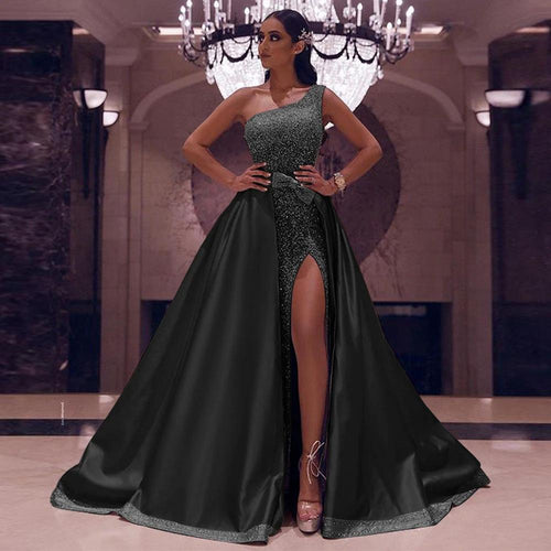 Mandotos one-shoulder mopping evening dress displayed on a mannequin, elegant black formal gown for special occasions.
