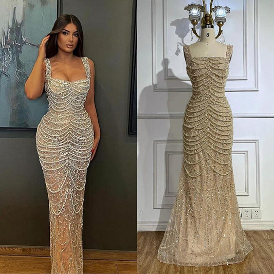 Nude elegant sling dress by MANDOTOS with light luxury pearl bead details, high-end design, perfect for formal occasions.