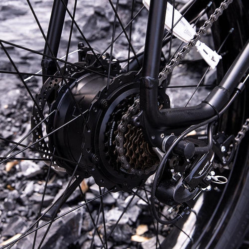 Mandotos electric mountain bike for adults with 26x4-inch fat tires, 1000W motor, 48V battery, ideal for trail riding and commuting.