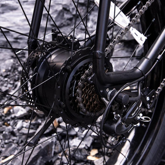 Mandotos electric mountain bike for adults with 26x4-inch fat tires, 1000W motor, 48V battery, ideal for trail riding and commuting.