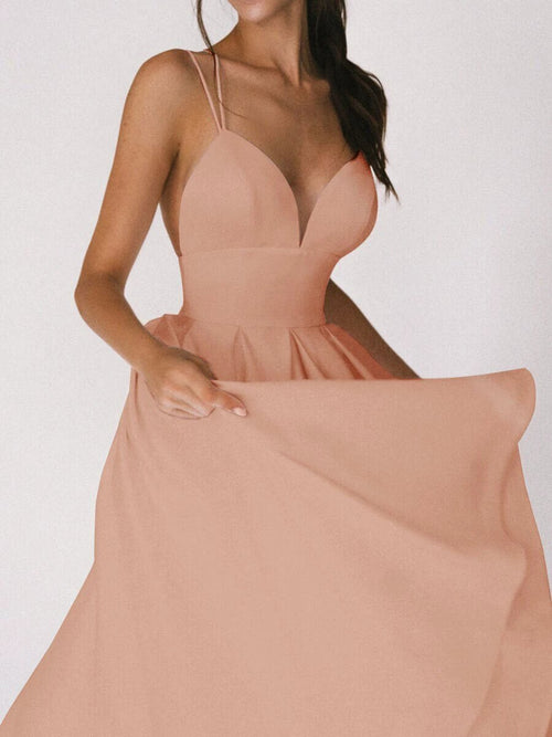 Mandotos women's sexy V-neck suspender dress, summer fashion A-line long dress with a stylish fit and sleeveless design.