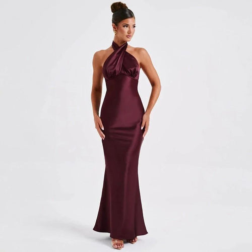 Mandotos summer fashion elegant backless sleeveless dress displayed on a model, showcasing a stylish and sophisticated design.