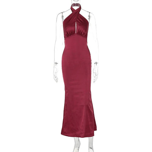 Elegant backless sleeveless summer dress by MANDOTOS, showcasing lightweight fabric and stylish design perfect for warm weather.