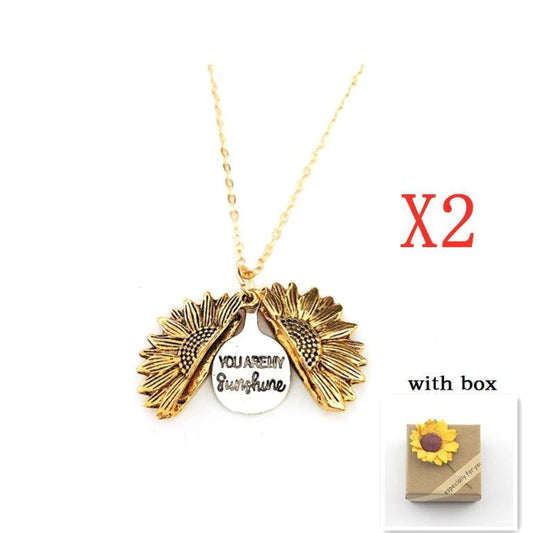 Mandotos sunflower double lettering necklace featuring a delicate chain with sunflower charms and personalized engraved initials.