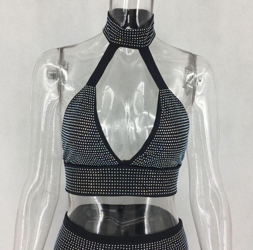 Women’s two-piece dress set by MANDOTOS featuring a stylish diamond-patterned design, perfect for elegant occasions.