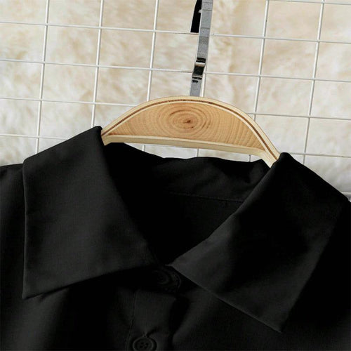 Women's elegant lapel button-down blouse with adjustable metal waist belt, solid color, loose fit, suitable for casual and office wear.