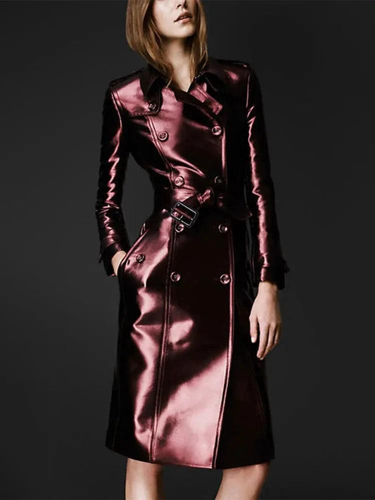 Women's slim fit leather high fashion coat by MANDOTOS, shown hanging with detailed stitching and stylish silhouette.
