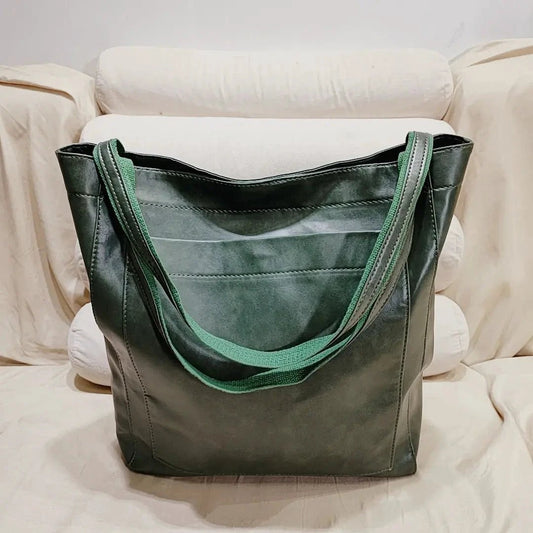 Women's soft leather vintage shoulder bag by MANDOTOS with a pocket, portable and stylish for everyday use.