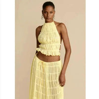 Mandotos 2-piece chic halter dress suit set featuring a stylish halter top and matching skirt, perfect for elegant occasions.