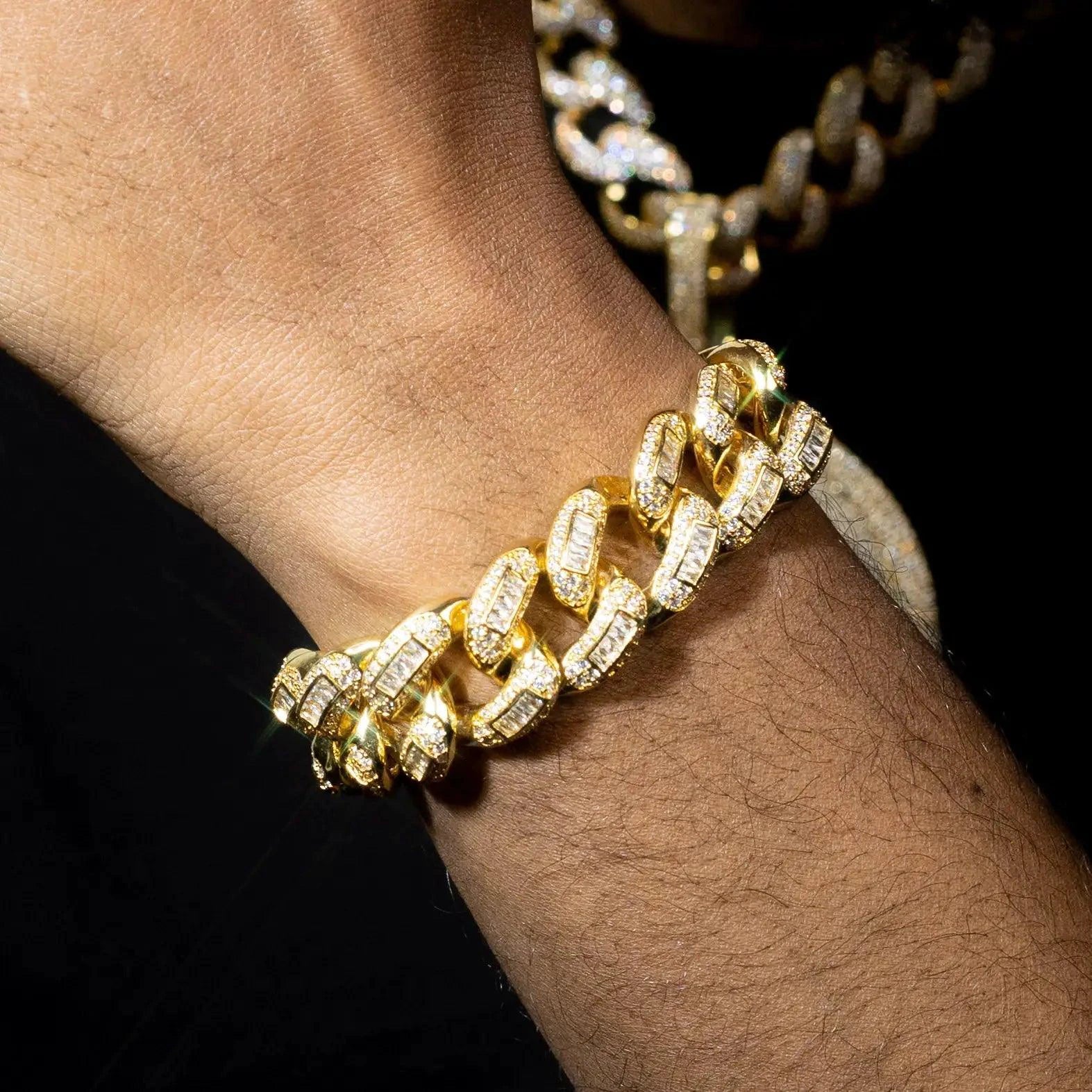 20mm luxury gold Cuban bracelet by MANDOTOS featuring thick, polished links and a secure clasp for a sophisticated look.