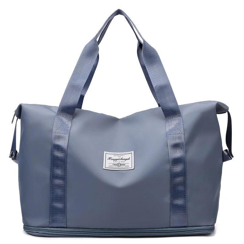Mandotos large capacity travel bag with shoulder strap, ideal for gym, workout, yoga, and outdoor activities.