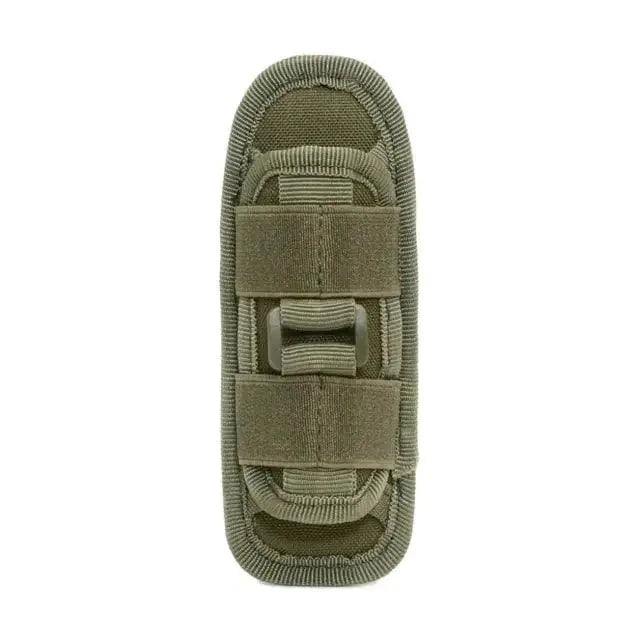Mandotos Adventure Belt Flashlight Carrier worn around the waist, designed to hold a flashlight securely during outdoor activities.