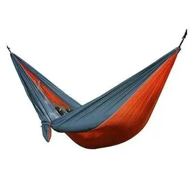 Mandotos Adventure Hammock Pack with lightweight hammock, straps, and gear for outdoor camping and relaxation.