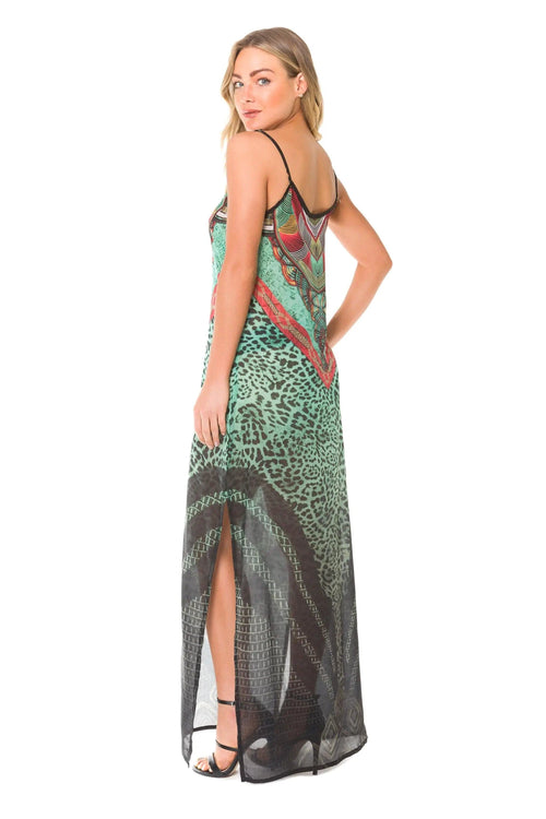 Mandotos Africa long dress featuring vibrant traditional patterns and flowing fabric, perfect for elegant cultural occasions.