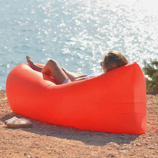 Mandotos AirLounge portable beach seat in vibrant color, designed for comfort and relaxation outdoors.
