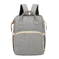 Mandotos all-in-one stroller diaper backpack with multiple compartments and adjustable straps, designed for parents on the go.