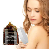 Mandotos Argan Rose Black Soap bar with natural ingredients, showcasing a dark, textured soap with rose and argan oil components.