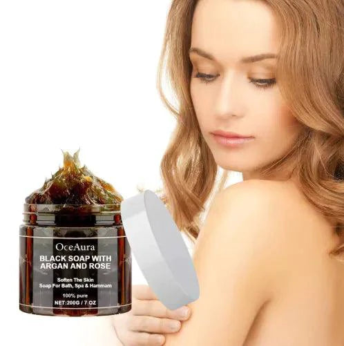 Mandotos Argan Rose Black Soap bar with natural ingredients, showcasing a dark, textured soap with rose and argan oil components.