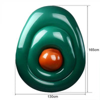 Mandotos avocado-shaped inflatable pool filled with water, perfect for summer relaxation and outdoor fun.