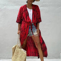 Mandotos Beach Chic Cover-Up worn over swimwear, lightweight fabric, perfect for sun-kissed beach adventures and effortless summer style.