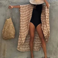 Mandotos Beach Chic Cover-Up with lightweight fabric, perfect for sun-kissed beach adventures and effortless summer style.