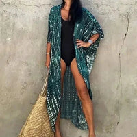 Mandotos Beach Chic Cover-Up featuring lightweight, stylish fabric perfect for sun-kissed beach adventures and effortless summer style.
