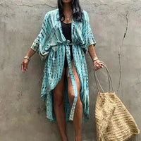 Mandotos beach chic cover-up with lightweight, breezy fabric perfect for sun-kissed beach adventures and effortless style.