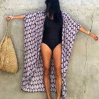 Mandotos Beach Chic Cover-Up with lightweight, flowy fabric, perfect for sun-kissed beach outfits and effortless summer style.