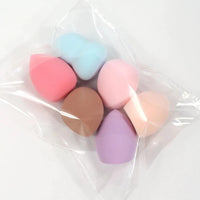 Mandotos beauty sponge set with foundation mixing puffs, available in 6 to 60 pieces, in various sizes and shapes for makeup application.