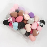 Mandotos beauty sponge set with 6 to 60 foundation mixing puffs, soft and versatile makeup applicators for flawless coverage.
