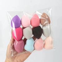 Mandotos beauty sponge set with 6 to 60 foundation mixing puffs in various sizes on a white background.