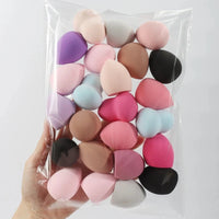 Set of 6 to 60 MANDOTOS beauty sponges and foundation mixing puffs for flawless makeup application, shown in various sizes.