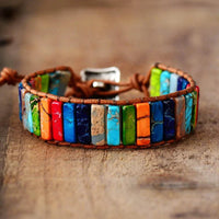 Mandotos boho chic leather bracelet featuring braided leather and decorative beads for a stylish, casual accessory.