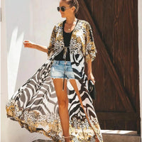 Mandotos Breeze Kimono Dress featuring flowing fabric, wide sleeves, and a relaxed fit perfect for summer wear.