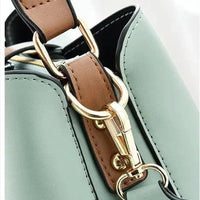 Mandotos Korean style bucket bag with shoulder strap, fashionable cross-border female bag in black leather with stitching details.