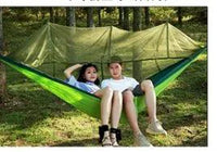 Mandotos bug-free camp hammock for two, featuring mosquito protection, ideal for outdoor relaxation and camping adventures.
