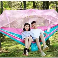 Mandotos bug-free camp hammock for two with mosquito protection, perfect for outdoor relaxation and serene camping experiences.