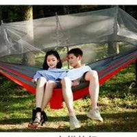 Mandotos bug-free camp hammock for two with mosquito protection, ideal for outdoor relaxation and serene camping experiences.