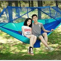 Mandotos Bug-Free Camp Hammock for two, featuring mosquito protection, ideal for outdoor relaxation in nature.