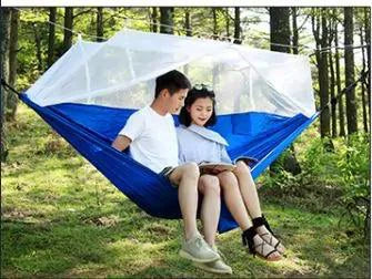 Mandotos bug-free camp hammock for two, featuring mosquito protection, ideal for outdoor relaxation and serene camping experiences.