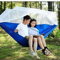 Mandotos bug-free camp hammock for two with mosquito protection, ideal for outdoor relaxation and serene camping experiences.