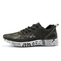 Mandotos men's casual breathable sneakers with hollow lace design, lightweight board shoes for everyday wear
