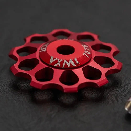Mandotos ceramic bicycle guide wheel with rear derailleur bearing axis adapter and jockey roller, compatible with 10T-17T gears.