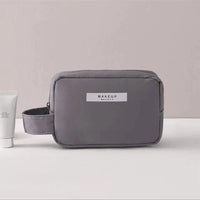 MANDOTOS Chic Beauty Bag Organizer with multiple compartments for cosmetics and accessories, compact and stylish for travel.