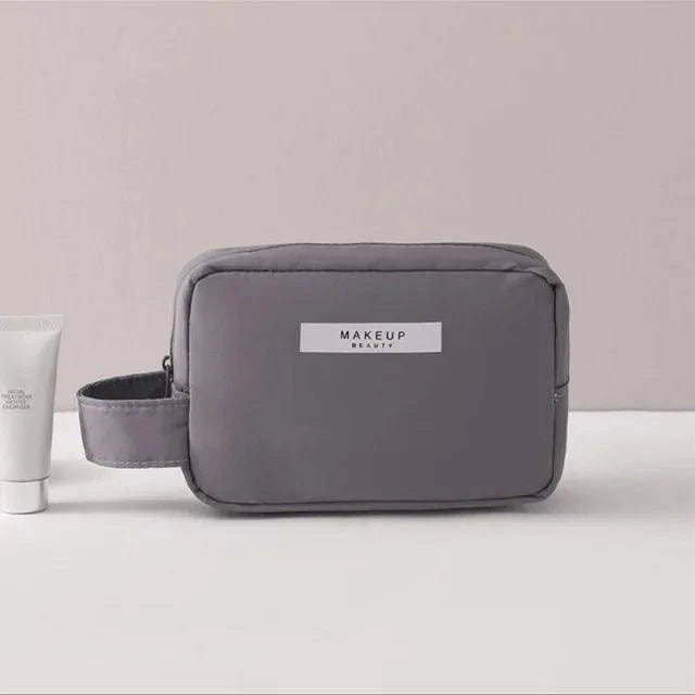 MANDOTOS Chic Beauty Bag Organizer with multiple compartments for cosmetics and accessories, compact and stylish for travel.